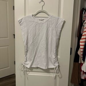 White top with ties on side. Size m